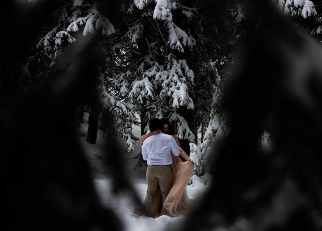 A couple eloping in Colorado in the snow in winter