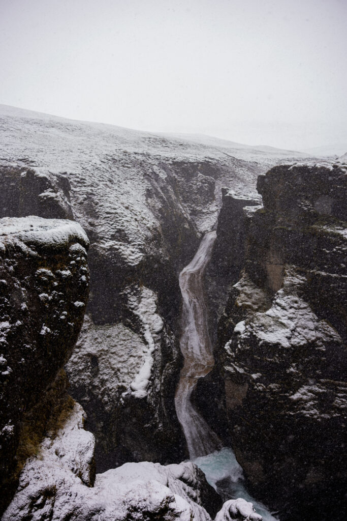Fjaðrárgljúfur canyon in iceland in the winter with snow