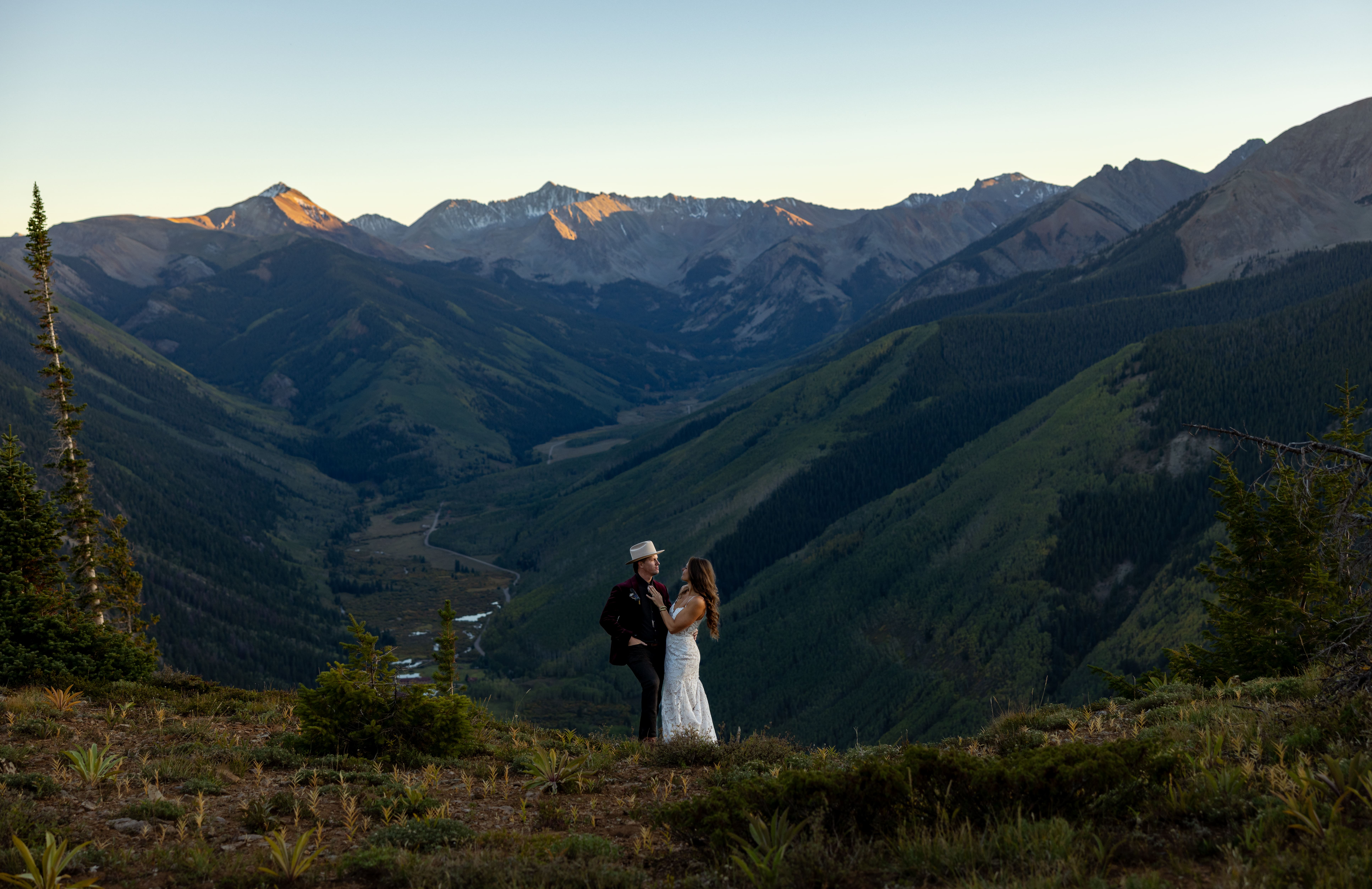 couple getting married on top of a mountain in aspen colorado