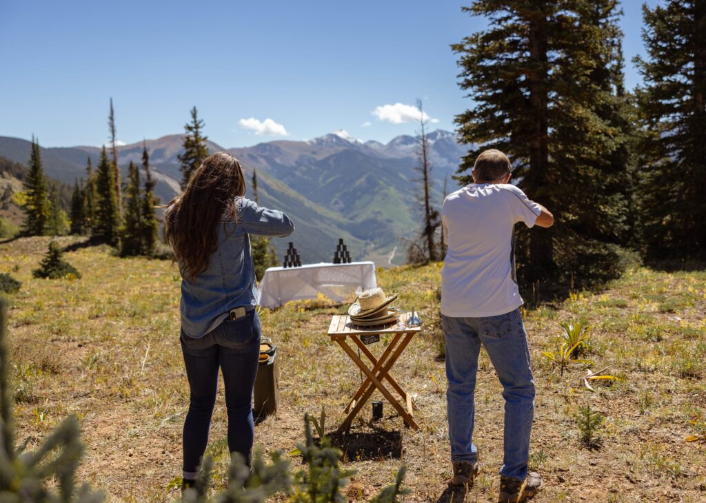 the smith cabin elopement in aspen colorado. Couple playing yard games for wedding