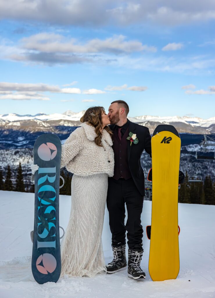 What activities to do for an elopement. Snowboarding at an elopement in Colorado. 