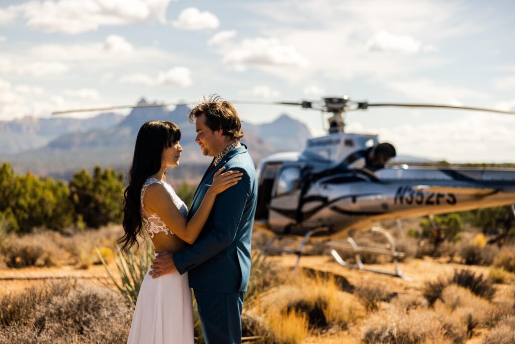 Things to do for your elopement. Riding a helicopter to the top of a mountain for an elopement. 