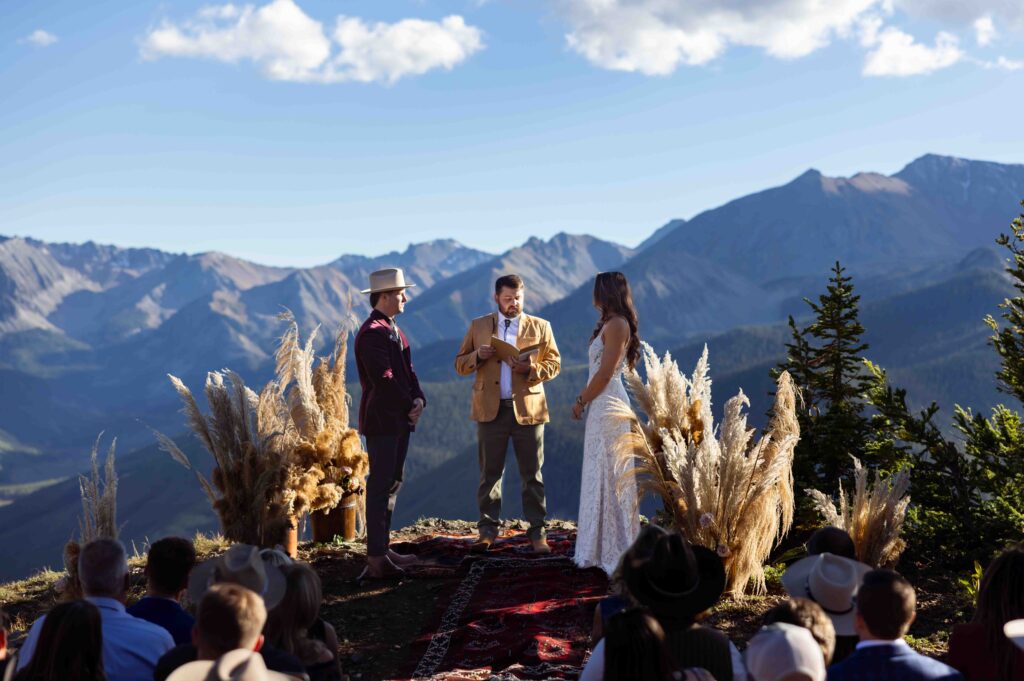 Bride and groom walking down the aisle as a married couple
