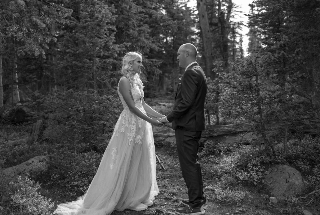 Bride and groom getting ready in a cozy cabin near Brainard Lake.