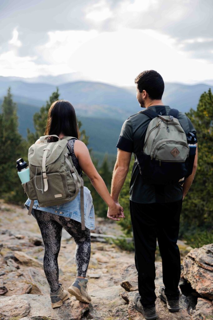 Close-up of hiking boots on the rocky trail, capturing the adventure elopement spirit.