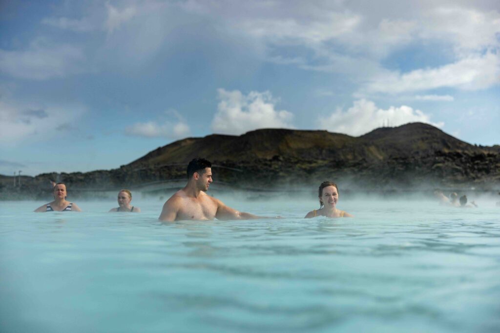 Aerial drone shot of the couple surrounded by Iceland’s wild beauty