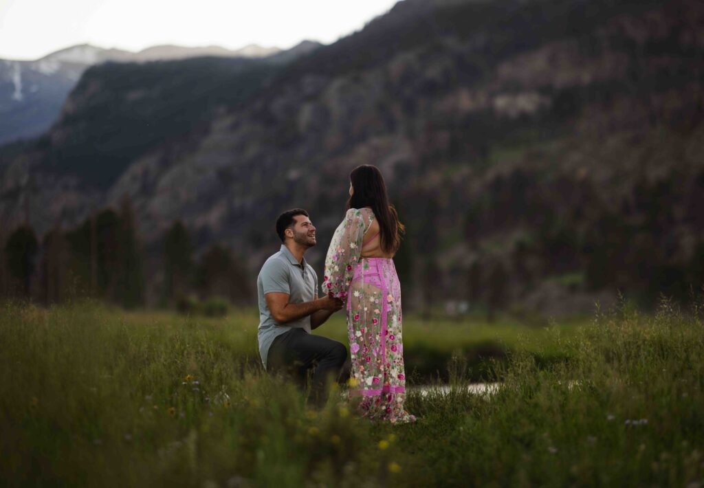 The couple embracing right after the proposal.