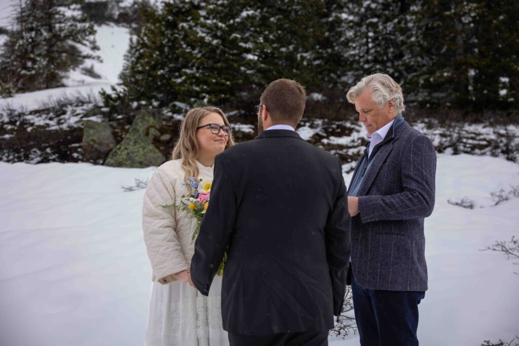 Emotional vow exchange in a foggy mountain clearing halfway down the pass
