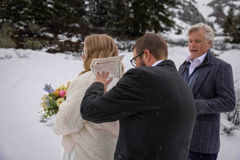 Emotional vow exchange in a foggy mountain clearing halfway down the pass
