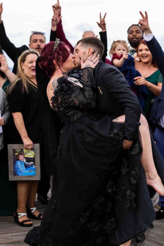 Emotional moment as the bride wipes away a tear during the vows
