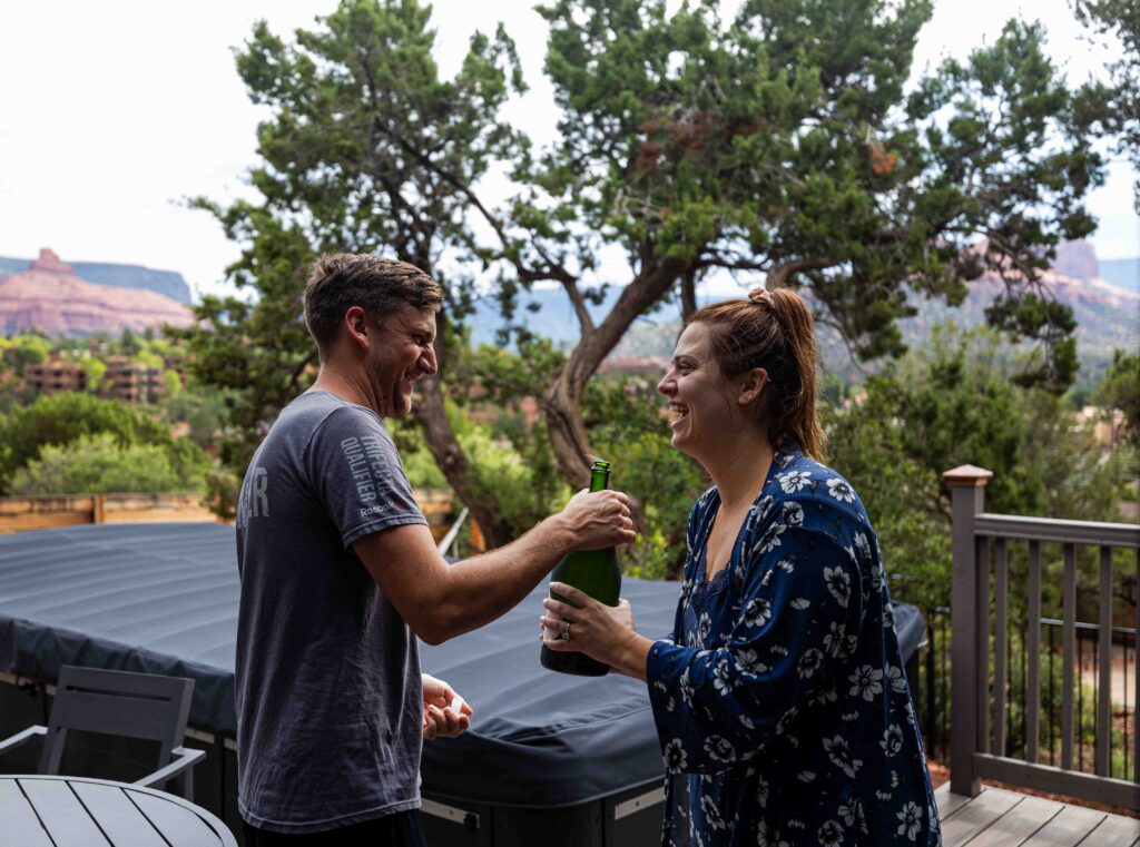 Parents helping the couple prepare a homemade breakfast on their wedding day
