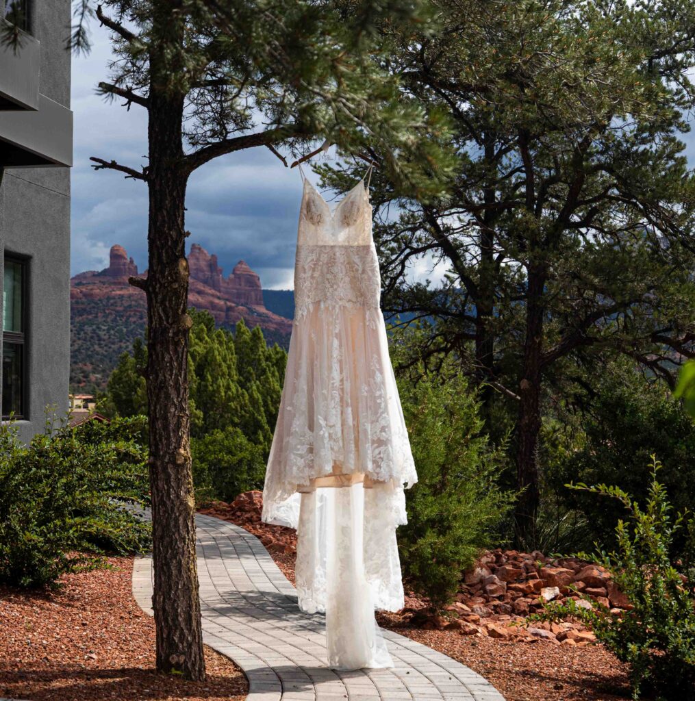 Bride twirling in her dress in a charming cobblestone alley
