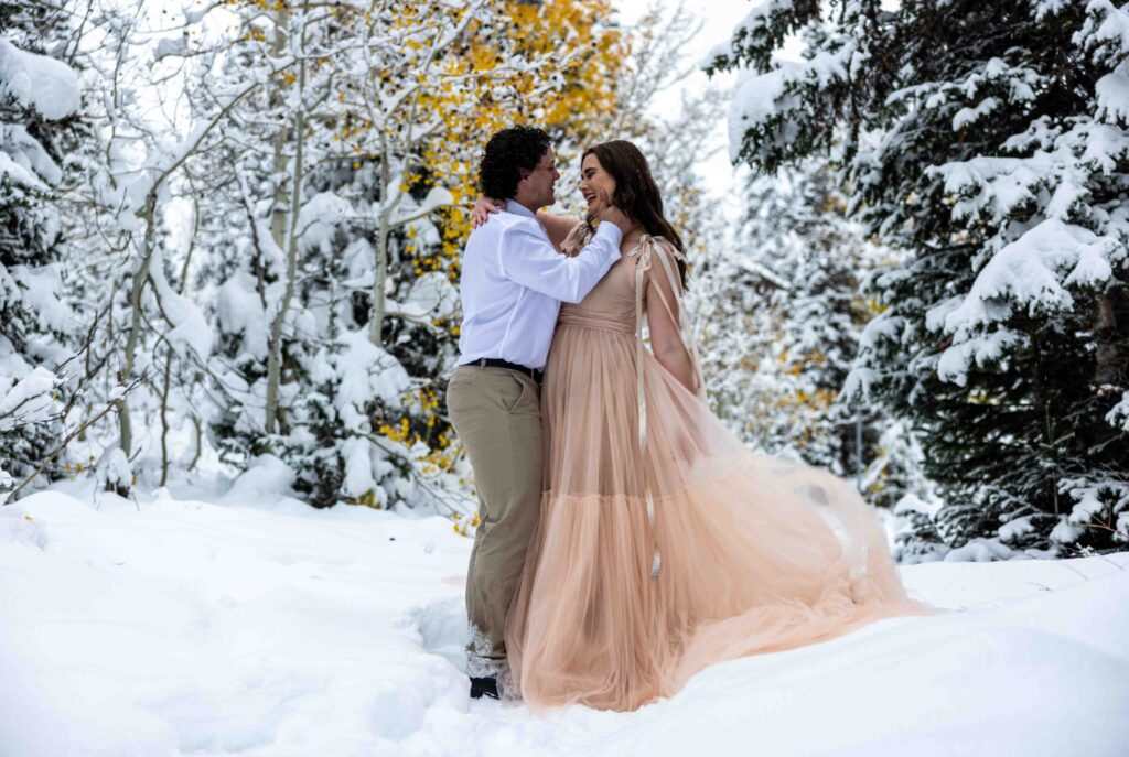 Couple exchanging vows in a remote snowy clearing