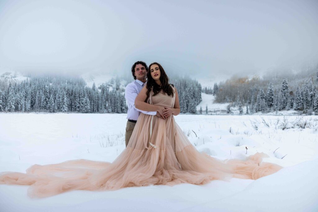 Couple hiking through snow-covered trails near Silver Lake